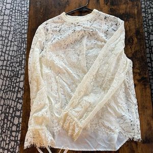Cream lace top with bows on wrists